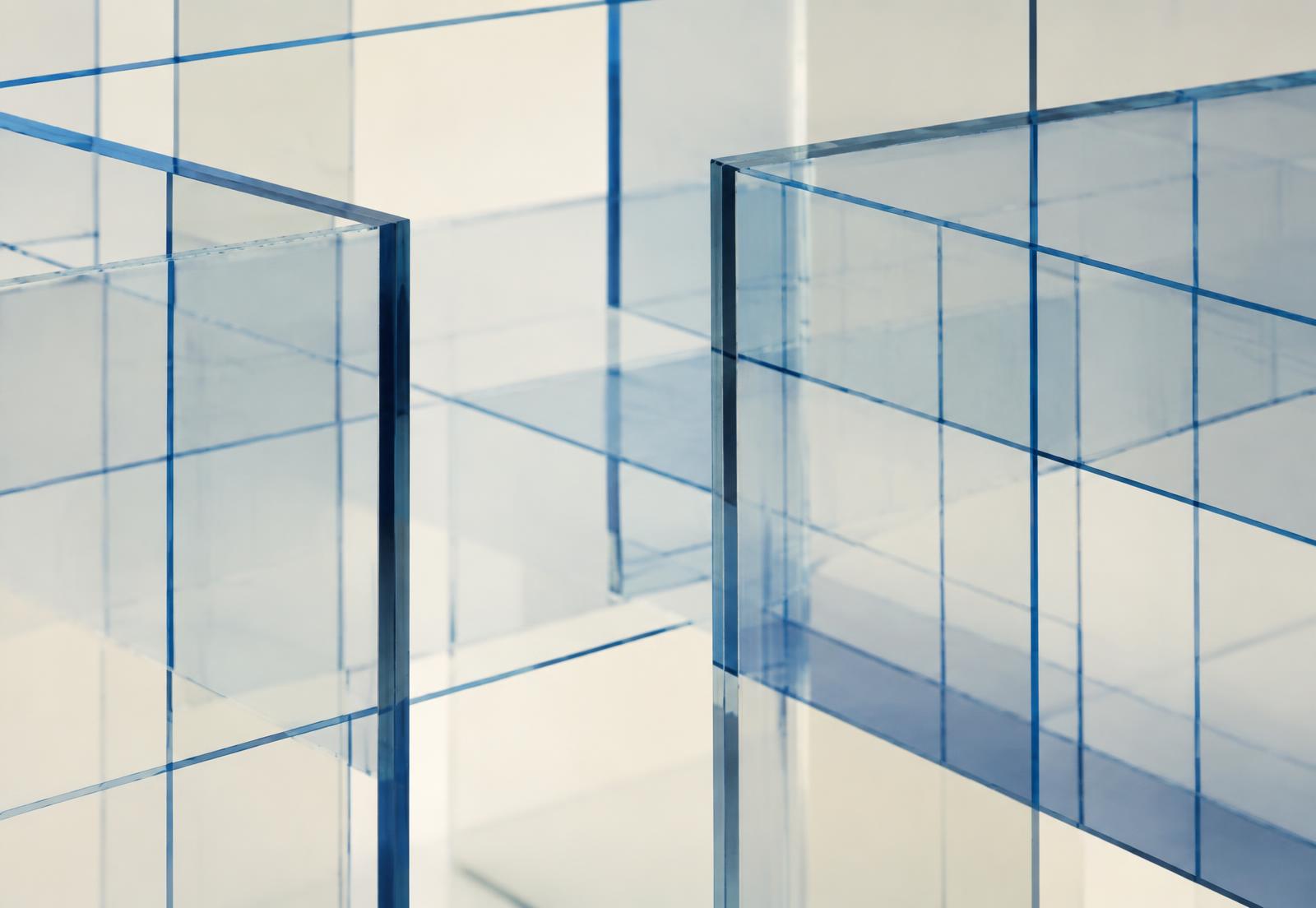 Layered translucent panels overlaid with a fine blue technical grid, representing software system architecture